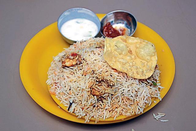 Kerala Hotel is famous for serving authentic spicy food and incredibly cheap prices, with prawns biryani being the standout dish. (PHOTOS: SHIVAM SAXENA/HT) Kerala Hotel is famous for serving authentic spicy food and incredibly cheap prices, with prawns biryani being the standout dish. (PHOTOS: SHIVAM SAXENA/HT)