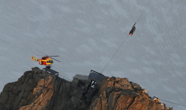 An EC-135 helicopter operated by the French Societe' Civile hovers. (AP) An EC-135 helicopter operated by the French Societe' Civile hovers. (AP)
