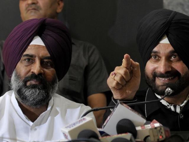 Navjot Singh Sidhu with MLA Pargat Singh during a media interaction at the Chandigarh Press Club in Chandigarh on September 8, 2016. MLA Balwinder Singh Bains was also present. (Ravi Kumar/HT Photo) Navjot Singh Sidhu with MLA Pargat Singh during a media interaction at the Chandigarh Press Club in Chandigarh on September 8, 2016. MLA Balwinder Singh Bains was also present. (Ravi Kumar/HT Photo)