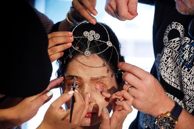 Reshma Quereshi has her hair and make up done ahead of walking the ramp at the New York Fashion Week on September 8, 2016. (Reuters) Reshma Quereshi has her hair and make up done ahead of walking the ramp at the New York Fashion Week on September 8, 2016. (Reuters)