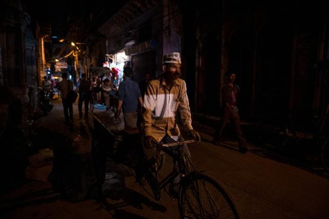 Ram Babu parks his delivery trolley near his makeshift ice shop as he finishes his day of selling ice. (AFP) Ram Babu parks his delivery trolley near his makeshift ice shop as he finishes his day of selling ice. (AFP)