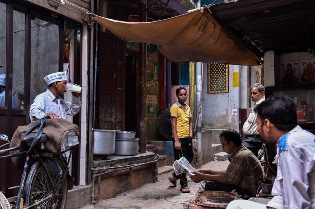 Ram Babu (L) drinks refreshments as he takes some time off from work. (AFP) Ram Babu (L) drinks refreshments as he takes some time off from work. (AFP)
