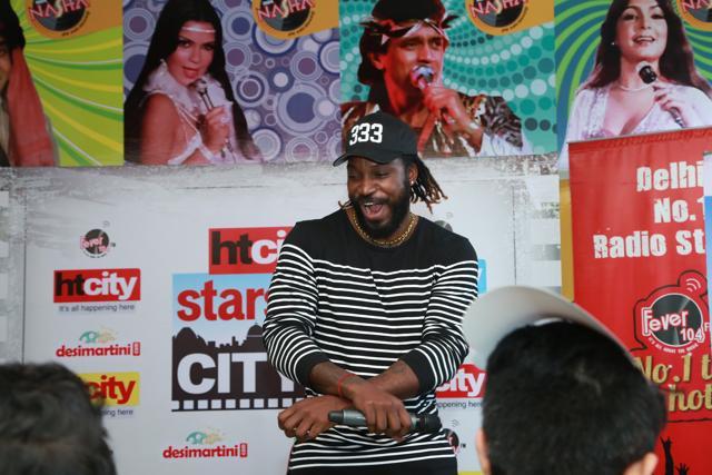 OPPA GAYLE STYLE: Cricketer Chris Gayle does the signature Gangnam Style dance step. (Photo: Amal Ks/ HT)