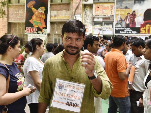 Vijay Kumar, Akhil Bharatiya Vidyarthi Parishad’s candidate for the general secretary post in the JNU students’ union , near a polling booth at the university on Friday. (Vipin Kumar/HT Photo) Vijay Kumar, Akhil Bharatiya Vidyarthi Parishad’s candidate for the general secretary post in the JNU students’ union , near a polling booth at the university on Friday. (Vipin Kumar/HT Photo)
