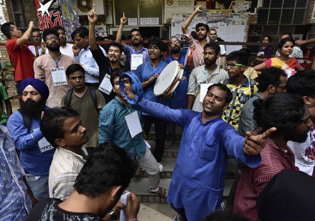 ABVP supporters near a polling booth at the Jawaharlal Nehru University on Friday. (Vipin Kumar/HT Photo) ABVP supporters near a polling booth at the Jawaharlal Nehru University on Friday. (Vipin Kumar/HT Photo)