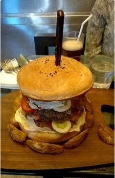 The WTF burger costs Rs 800, has a triple patty and, if you can finish it in 25 minutes, it’s free. The WTF burger costs Rs 800, has a triple patty and, if you can finish it in 25 minutes, it’s free.