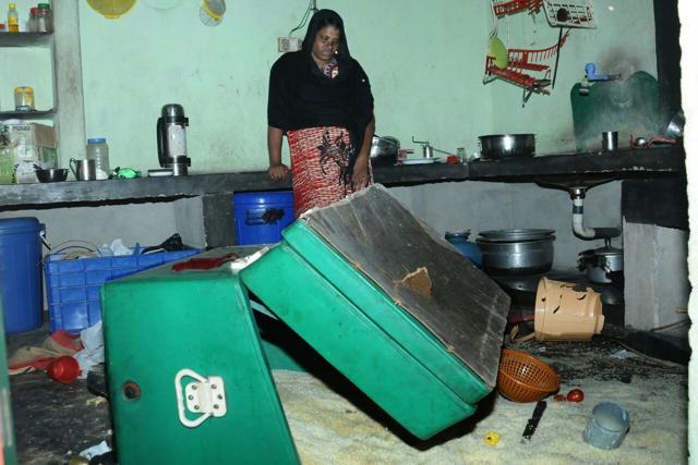 Syed Mon’s wife at her damaged house in Thanur. (Photo credit: By special arrangement) Syed Mon’s wife at her damaged house in Thanur. (Photo credit: By special arrangement)