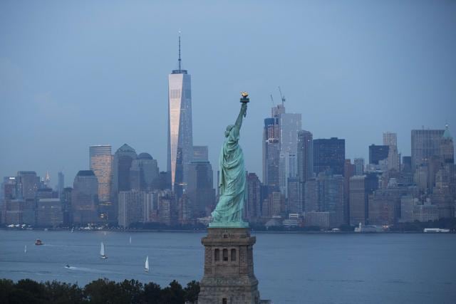 The Statue of Liberty stands in the foreground as Lower Manhattan and the shiny new World Trade Centre One is seen at dusk, on September 8, 2016 in New York. The city is preparing to mark the 15th anniversary of the September 11 terrorist attacks. (AFP) The Statue of Liberty stands in the foreground as Lower Manhattan and the shiny new World Trade Centre One is seen at dusk, on September 8, 2016 in New York. The city is preparing to mark the 15th anniversary of the September 11 terrorist attacks. (AFP)