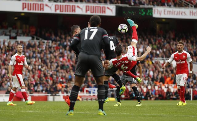 Laurent Koscielny scores Arsenal’s first goal. (REUTERS)