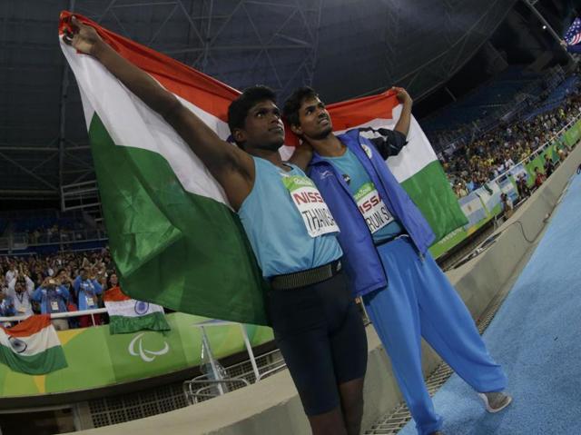 Gold medallist Mariyappan Thangavelu of India (L) celebrates with compatriot and bronze medal winner Varun Singh Bhati after the men’s high jump T42 final at the Rio Paralympics on September 9, 2016. (REUTERS)