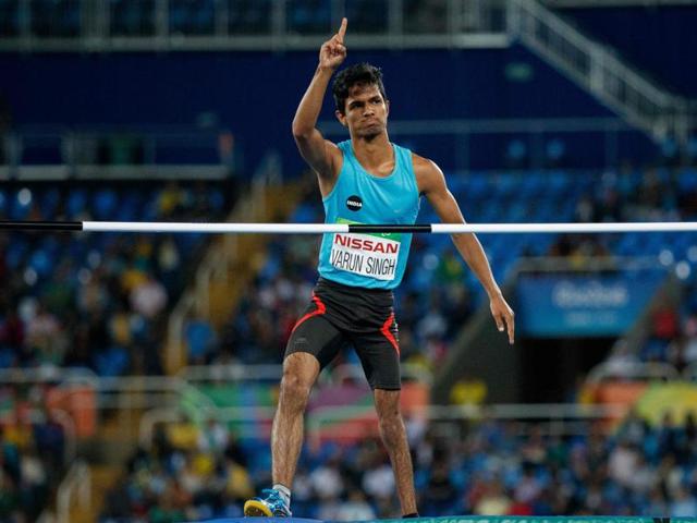 Varun Singh Bhati acknowledges the crowd after his bronze medal-winning jump of 1.86m. (AFP)