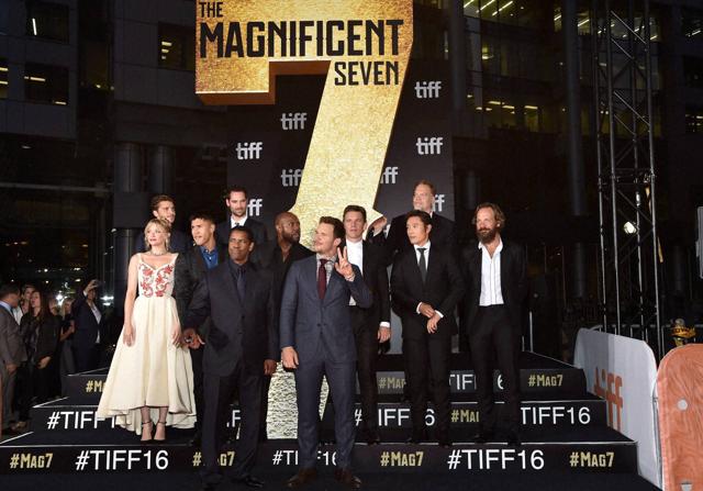 Toronto : Lucas Grimes, back row from left, Manuel Garcia-Rulfo, Vincent D'Onofrio, from center row left, Haley Bennett, Martin Sensmeier, Antoine Fuqua, Ethan Hawke, Byung-hun Lee, Peter Sarsgaard, and front row from left, Denzel Washinton and Chris Pratt attend The Magnificent Seven premiere on day 1 of the Toronto International Film Festival at the Roy Thomson Hall on Thursday. (AP) Toronto : Lucas Grimes, back row from left, Manuel Garcia-Rulfo, Vincent D'Onofrio, from center row left, Haley Bennett, Martin Sensmeier, Antoine Fuqua, Ethan Hawke, Byung-hun Lee, Peter Sarsgaard, and front row from left, Denzel Washinton and Chris Pratt attend The Magnificent Seven premiere on day 1 of the Toronto International Film Festival at the Roy Thomson Hall on Thursday. (AP)