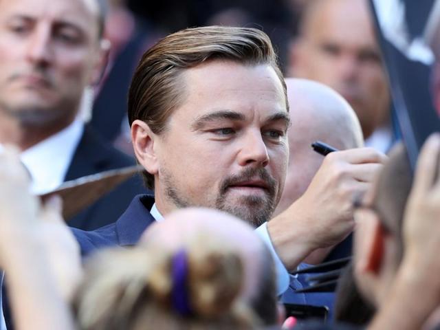Actor Leonardo DiCaprio is surrounded by fans as he arrives for the premier of the film Before the Flood, a documentary chronicling the actor’s efforts at spreading awareness about global warming around the world. (REUTERS) Actor Leonardo DiCaprio is surrounded by fans as he arrives for the premier of the film Before the Flood, a documentary chronicling the actor’s efforts at spreading awareness about global warming around the world. (REUTERS)