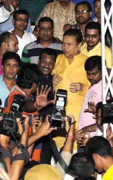 File photo of Madan Mitra (in yellow kurta) being discharged from SSKM hospital after he got bail from Alipore Court on October 31, 2015 and went his Bhawanipore home. (Samir Jana) File photo of Madan Mitra (in yellow kurta) being discharged from SSKM hospital after he got bail from Alipore Court on October 31, 2015 and went his Bhawanipore home. (Samir Jana)