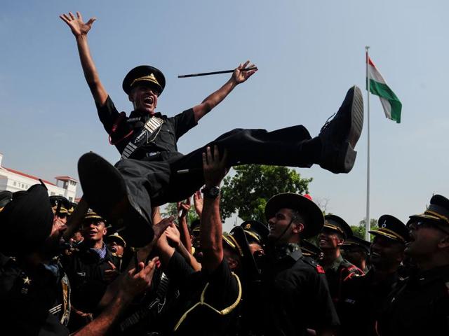 Indian army cadets celebrate after their graduation ceremony at the Officers Training Academy in Chennai on September 10, 2016. A total of 249 cadets, including 32 women, graduated from the academy and will be posted as lieutenants in the Indian Army. (AFP) 