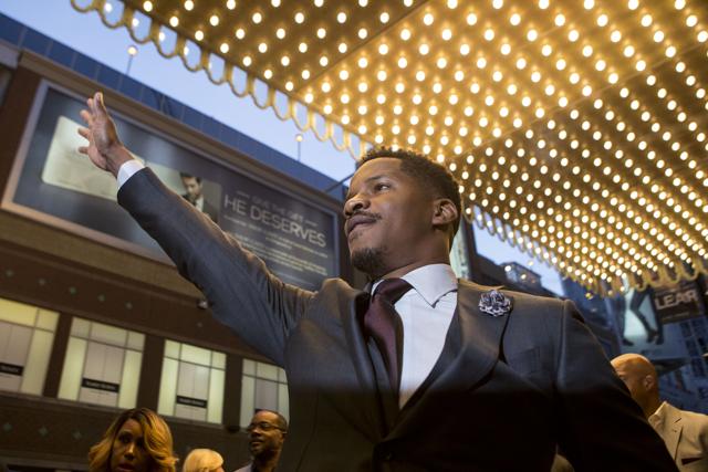 Director Nate Parker gestures to the crowd as he arrives on the red carpet for the film The Birth of a Nation during the 2016 Toronto International Film Festival in Toronto. (AP) Director Nate Parker gestures to the crowd as he arrives on the red carpet for the film The Birth of a Nation during the 2016 Toronto International Film Festival in Toronto. (AP)