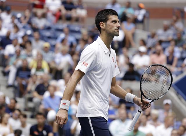 For a while, Djokovic was thrown off by Monfils’ unpredictable tactics. (AP) For a while, Djokovic was thrown off by Monfils’ unpredictable tactics. (AP)