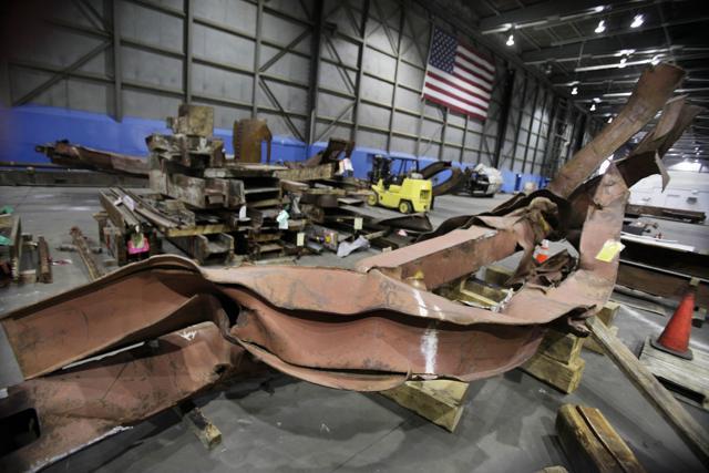 Twisted beams and other remains from the attacks at the World Trade Center in a hangar at New York's John F Kennedy International Airport in March 2011. These are part of the painful relics from that fateful day. (AP File Photo) Twisted beams and other remains from the attacks at the World Trade Center in a hangar at New York's John F Kennedy International Airport in March 2011. These are part of the painful relics from that fateful day. (AP File Photo)