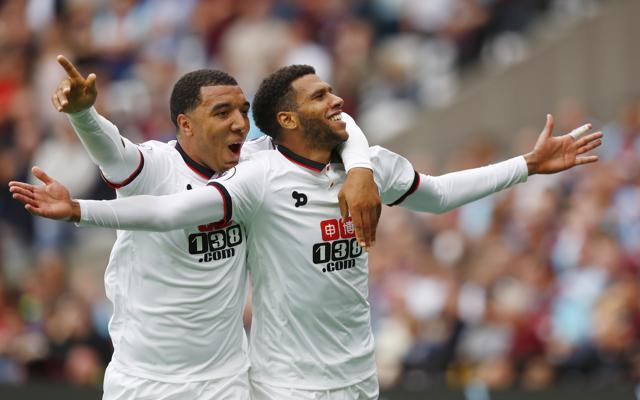 Watford's Etienne Capoue celebrates scoring their third goal with Troy Deeney. (REUTERS)
