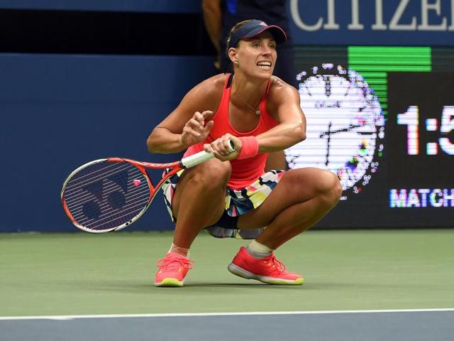 Kerber bends down to return a low ball. (AFP) Kerber bends down to return a low ball. (AFP)