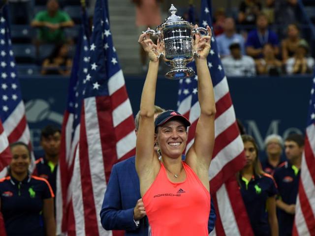 Angelique Kerber of Germany holds up her winning trophy after defeating Karolina Pliskova of Czech Republic in the 2016 US Open women’s Singles final match at the USTA Billie Jean King National Tennis Center in New York on September 10, 2016. New world number one Kerber won with a battling 6-3, 4-6, 6-4 victory over Pliskova. (AFP) Angelique Kerber of Germany holds up her winning trophy after defeating Karolina Pliskova of Czech Republic in the 2016 US Open women’s Singles final match at the USTA Billie Jean King National Tennis Center in New York on September 10, 2016. New world number one Kerber won with a battling 6-3, 4-6, 6-4 victory over Pliskova. (AFP)