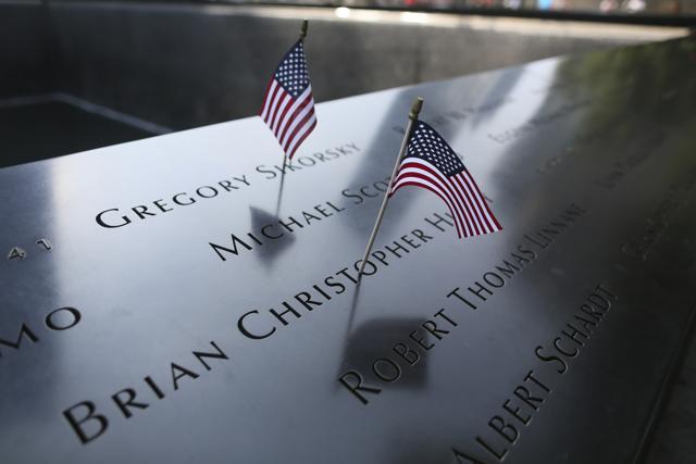 American flags are placed on the south pool of the National September 11 Memorial. (AP Photo) American flags are placed on the south pool of the National September 11 Memorial. (AP Photo)