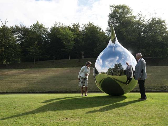 The Duke and the Duchess pose near a sculpture by British artist Richard Hudson titled 'Tear,' installed as part of the 'Beyond Limits' exhibition. (AFP) The Duke and the Duchess pose near a sculpture by British artist Richard Hudson titled 'Tear,' installed as part of the 'Beyond Limits' exhibition. (AFP)