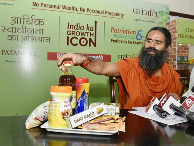 Yoga guru Ramdev displays his company Patanjali’s products at a press conference in Delhi.(HT File Photo) Yoga guru Ramdev displays his company Patanjali’s products at a press conference in Delhi.(HT File Photo)