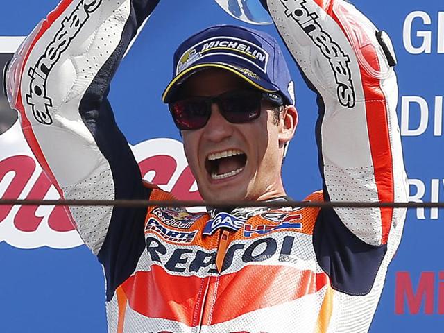 Honda's Dani Pedrosa (centre), of Spain, is flanked by Yamaha's Valentino Rossi (left) and Jorge Lorenzo in Misano Adriatico, Italy, on Sunday. (AP) Honda's Dani Pedrosa (centre), of Spain, is flanked by Yamaha's Valentino Rossi (left) and Jorge Lorenzo in Misano Adriatico, Italy, on Sunday. (AP)