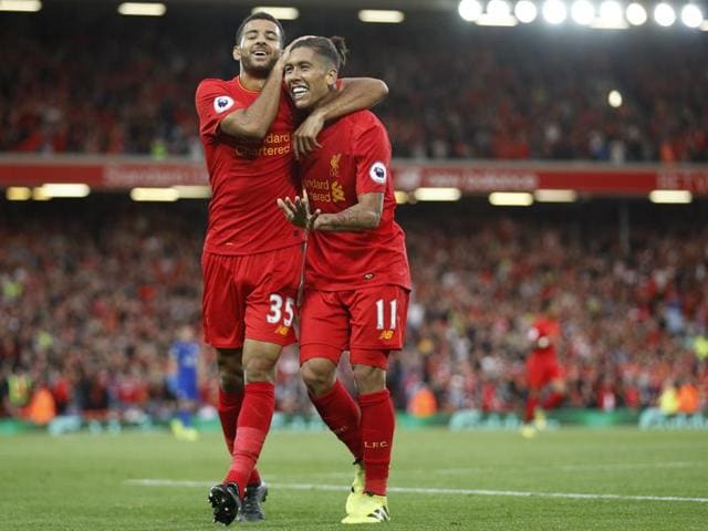Liverpool's Roberto Firmino celebrates scoring their fourth goal. (REUTERS) Liverpool's Roberto Firmino celebrates scoring their fourth goal. (REUTERS)