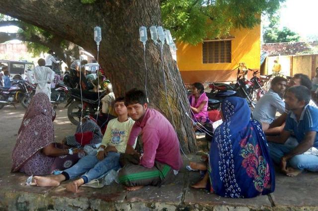 Patients being treated under the tree at the Community health centre in Sempau. (HT Photo) Patients being treated under the tree at the Community health centre in Sempau. (HT Photo)