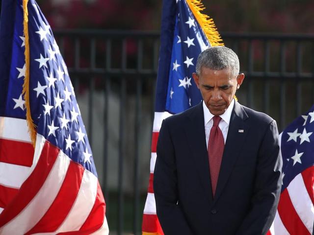 US President Barack Obama participates in a moment of silence during a ceremony to mark the 15th anniversary of the 9/11 terrorists attacks at the Pentagon Memorial in Arlington, Virginia. (AFP Photo) US President Barack Obama participates in a moment of silence during a ceremony to mark the 15th anniversary of the 9/11 terrorists attacks at the Pentagon Memorial in Arlington, Virginia. (AFP Photo)