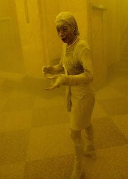 This 11 September 2001 file photo shows Marcy Borders covered in dust as she takes refuge in an office building after one of the World Trade Center towers collapsed in New York. Borders was caught outside on the street as the cloud of smoke and dust enveloped the area. The woman was caught outside on the street as the cloud of smoke and dust enveloped the area. (AFP) This 11 September 2001 file photo shows Marcy Borders covered in dust as she takes refuge in an office building after one of the World Trade Center towers collapsed in New York. Borders was caught outside on the street as the cloud of smoke and dust enveloped the area. The woman was caught outside on the street as the cloud of smoke and dust enveloped the area. (AFP)