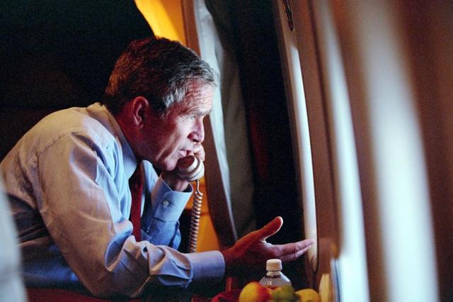 In this photo released by The White House 16 September, 2001, US President George W Bush speaks by phone from Air Force One with US vice-president Dick Cheney after departing Air Force Base in Nebraska, 11 September, 2001. (AFP) In this photo released by The White House 16 September, 2001, US President George W Bush speaks by phone from Air Force One with US vice-president Dick Cheney after departing Air Force Base in Nebraska, 11 September, 2001. (AFP)