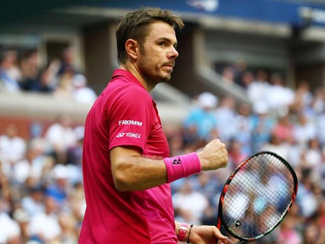 Stan Wawrinka of Switzerland reacts against Novak Djokovic of Serbia. (AFP Photo)