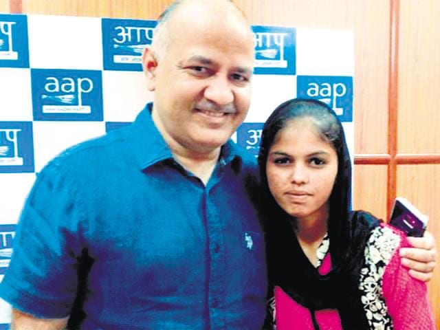 Manish Sisodia with Madhu. Manish Sisodia with Madhu.