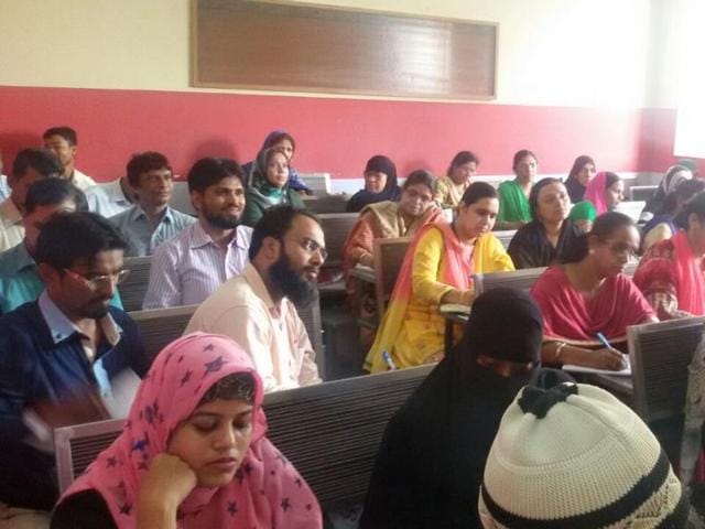 A file photo of people studying at Urdu cultural centre, which was once a Mumbai cultural landmark and now has been shut down.