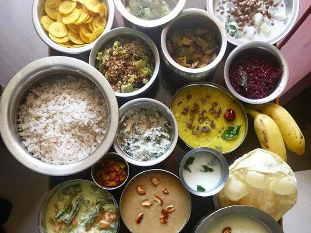 The mouth-watering lunch includes chips, poppadoms, various vegetables, a variety of sweet and sour pickles, the traditional aviyal, sambar, dal along with a small quantity of ghee, rasam, two different kinds of buttermilk, a chutney powder prepared from grated coconut and a series of payasams eaten either straight or mixed with a small ripe plantain.