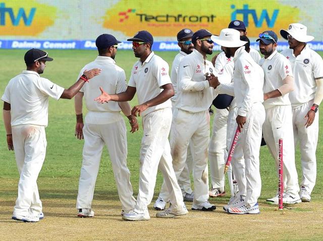 Indian players congratulate one another at the end of their match against the West Indies. (AFP Photo) Indian players congratulate one another at the end of their match against the West Indies. (AFP Photo)