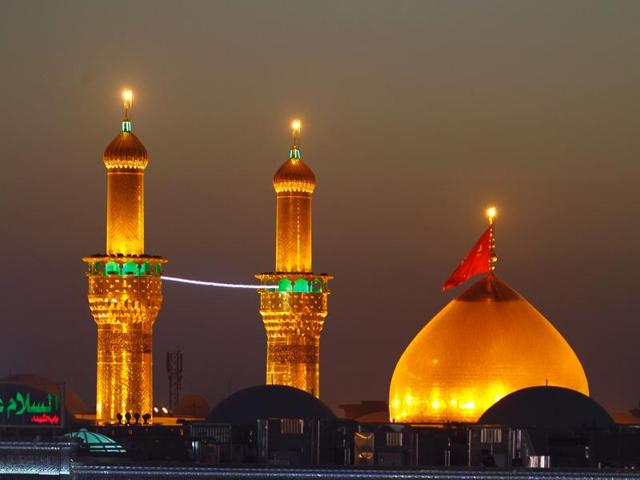 Shia Muslim pilgrims gather in front of the shrine of Imam Hussein, a grandson of the Prophet Mohammed, on Arafah day, in Karbala. (AFP Photo)