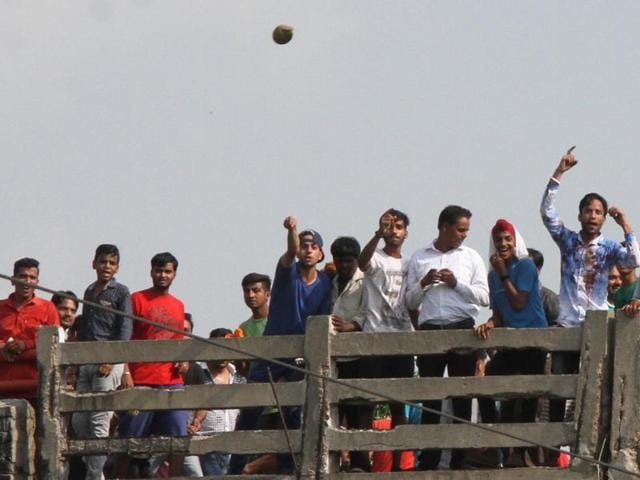 The protesters pelted police and the trains with stones, and clashed with the passengers who resisted. (JS Grewal/HT Photo)