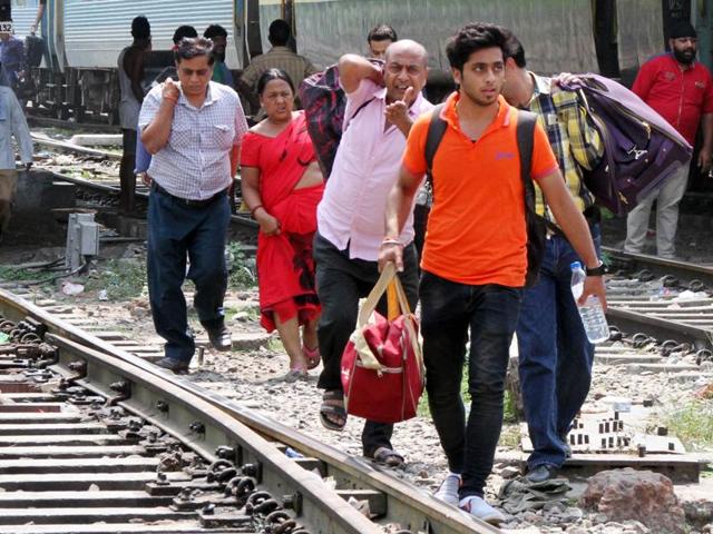 The passengers were forced to leave the railway station as the protest turned violent and the trains were cancelled. (JS Grewal/HT Photo)