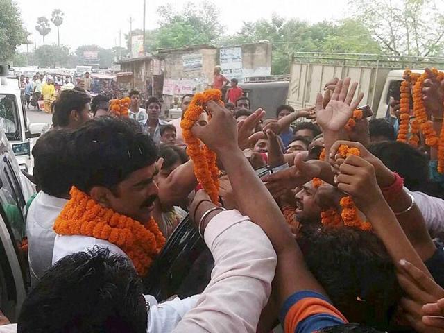 Mohammad Shahabuddin greeted by supporters after he was released on bail. (PTI) Mohammad Shahabuddin greeted by supporters after he was released on bail. (PTI)