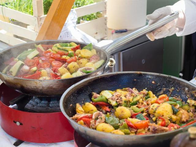 Eating in an ‘open concept kitchen,’ with greater visibility and convenience of food access, can set off a chain reaction. We’re more likely to get up and head towards the food more often, serve more food and eat more food. (Shutterstock)