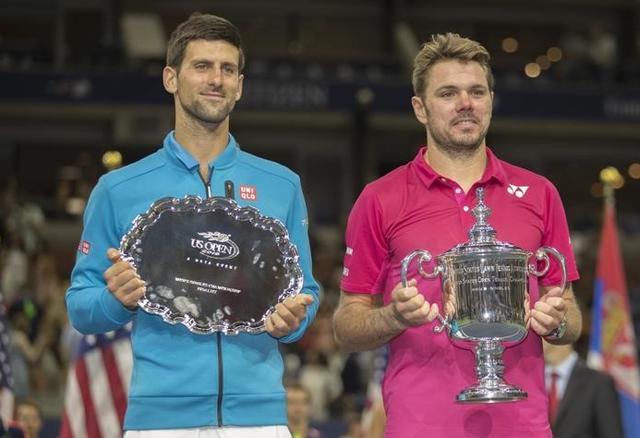Novak Djokovic (SRB) and Stan Wawrinka (SUI) at the trophy presentation ceremony. (Reuters Photo) Novak Djokovic (SRB) and Stan Wawrinka (SUI) at the trophy presentation ceremony. (Reuters Photo)