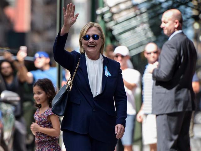 US Democratic presidential nominee Hillary Clinton gets in her car while leaving her daughter's apartment after resting on September 11 in New York. Clinton departed from a ceremony on the 15th anniversary of the 9/11 attacks after feeling "overheated," but was later doing "much better". (AFP) US Democratic presidential nominee Hillary Clinton gets in her car while leaving her daughter's apartment after resting on September 11 in New York. Clinton departed from a ceremony on the 15th anniversary of the 9/11 attacks after feeling "overheated," but was later doing "much better". (AFP)