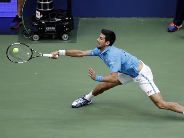 Novak Djokovic, of Serbia, returns a shot. (AP photo)