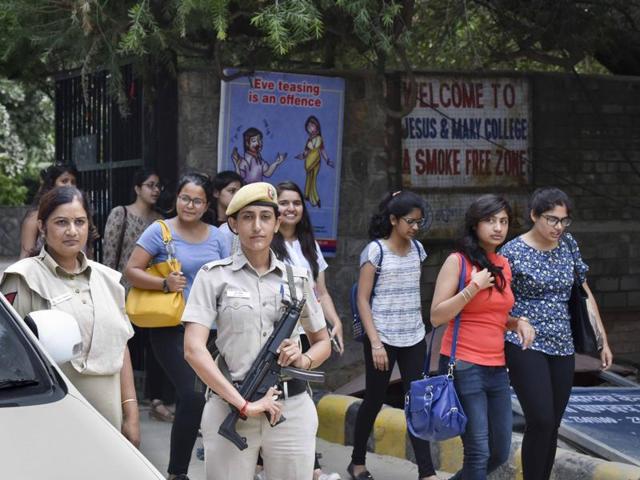 Anita, a woman police personnel with a newly launched all-women PCR van unit outside Jesus & Mary College in New Delhi. (Arun Sharma/HT Photo)