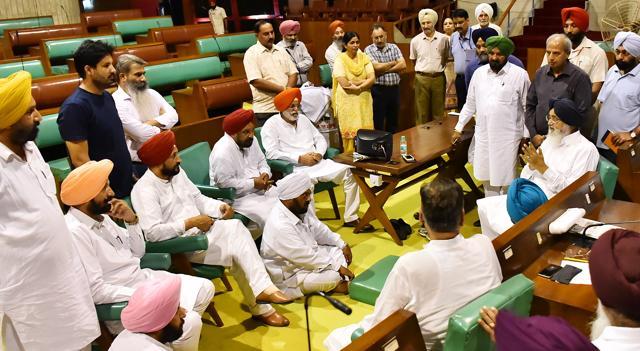 CM Badal (seated, right) meeting the MLAs inside the assembly hall in the afternoon. (Photo: CMO)