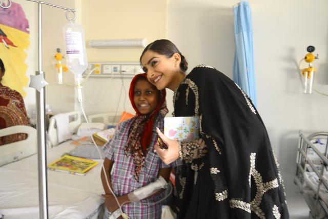 Sonam Kapoor with a caner patient.